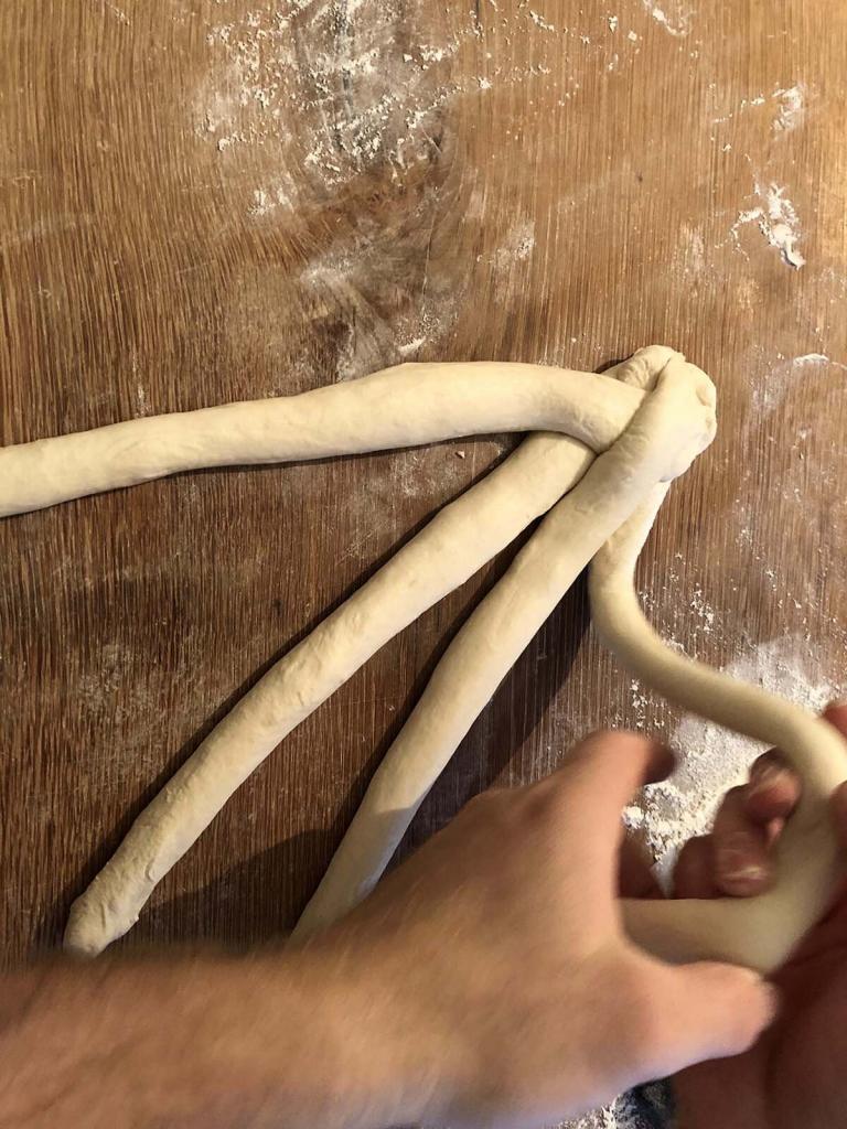 Shaping a plait