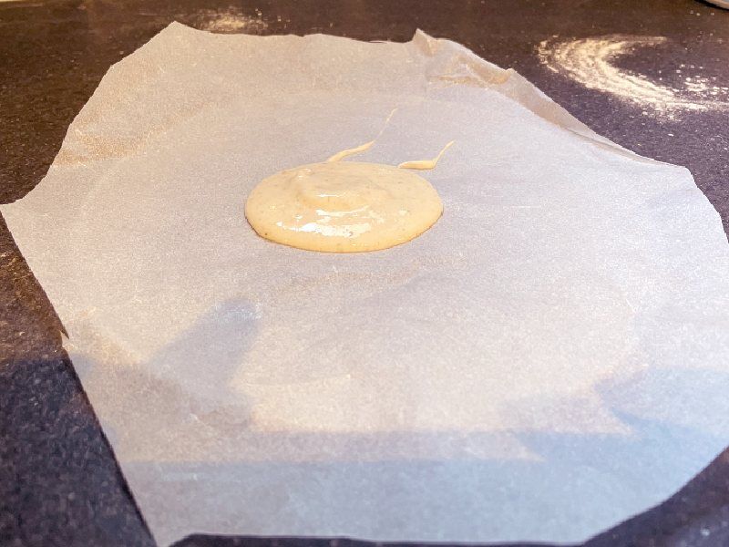 Take a portion of starter on a silicone sheet