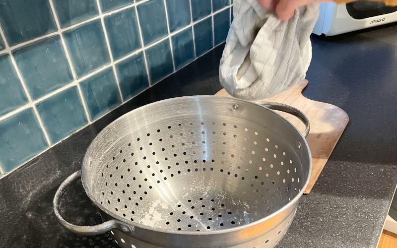 Lift the dough out the basket