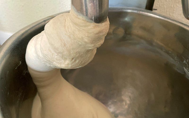 Dough climbs up the dough hook